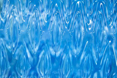 Arka plan. Hoş gökkuşağı mavi tonları. Yumuşak dalgalar renk. Oynak mavi tonları deniz yüzeyi ile rezonansa. Yüzeyi küçük damlacıklar.