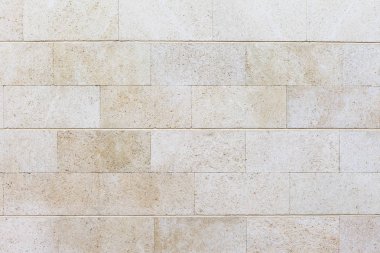 Beyaz taş dokusuna. Doğru duvar beyaz kumtaşı. Tuğla duvar.