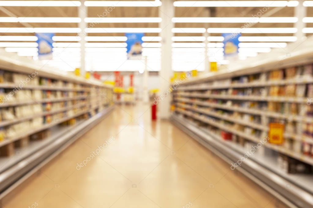 Blurred photos showcases shops. Long rows of racks with goods.