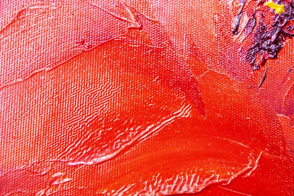 Multicolored smears with oil paint on the canvas. Part of the oil paints picture. Texture of color brush strokes. Close up.