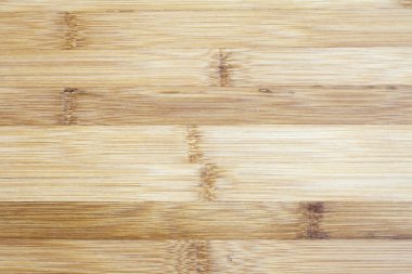 Doğal bambu ahşap tahta. Dokular, arka planda açık sarı krem bej kahverengi renk desen. Yumuşak bir yüzey canlı tonları.