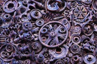 Steampunk arka plan, makine parçaları, büyük dişli ve zincir makineleri ve traktörler. Eski paslı makine parçaları. Yaylar, rulmanlar, pistonlar, milleri, milleri.