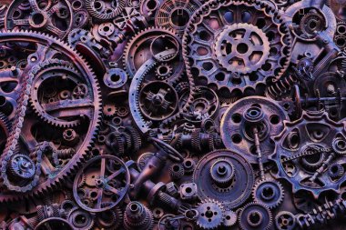 Steampunk arka plan, makine parçaları, büyük dişli ve zincir makineleri ve traktörler. Eski paslı makine parçaları. Yaylar, rulmanlar, pistonlar, milleri, milleri.