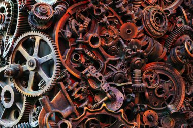 Steampunk arka plan, makine parçaları, büyük dişli ve zincir makineleri ve traktörler. Eski paslı makine parçaları. Yaylar, rulmanlar, pistonlar, milleri, milleri.