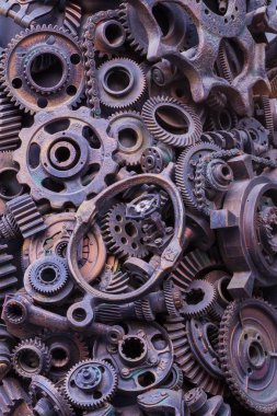 Steampunk arka plan, makine parçaları, büyük dişli ve zincir makineleri ve traktörler. Eski paslı makine parçaları. Yaylar, rulmanlar, pistonlar, milleri, milleri.