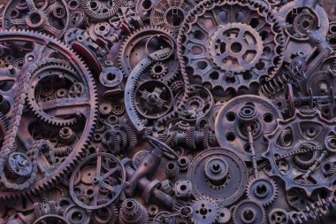 Steampunk arka plan, makine parçaları, büyük dişli ve zincir makineleri ve traktörler. Eski paslı makine parçaları. Yaylar, rulmanlar, pistonlar, milleri, milleri.