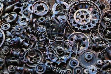 Steampunk arka plan, makine parçaları, büyük dişli ve zincir makineleri ve traktörler. Eski paslı makine parçaları. Yaylar, rulmanlar, pistonlar, milleri, milleri.