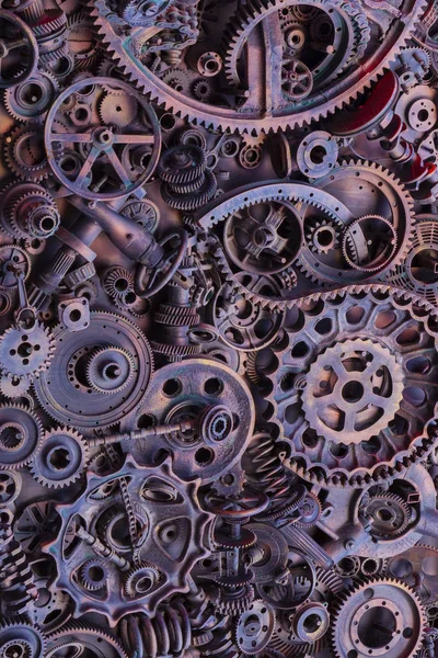 Steampunk arka plan, makine parçaları, büyük dişli ve zincir makineleri ve traktörler. Eski paslı makine parçaları. Yaylar, rulmanlar, pistonlar, milleri, milleri.