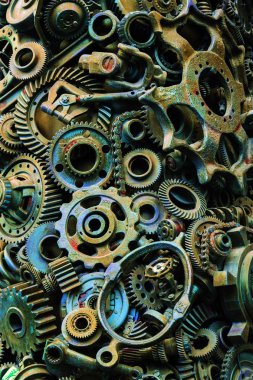 Steampunk arka plan, makine parçaları, büyük dişli ve zincir makineleri ve traktörler. Eski paslı makine ve mekanik parçalar. Yaylar, rulmanlar, pistonlar, milleri, milleri.