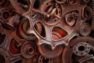 Steampunk arka plan, makine parçaları, büyük dişli ve zincir makineleri ve traktörler. Eski paslı makine parçaları. Yaylar, rulmanlar, pistonlar, milleri, milleri.