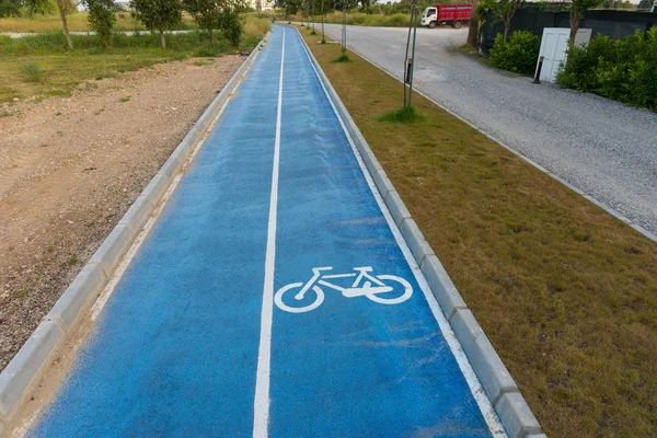 Pictogram Van Fiets Een Asfaltweg Met Een Wielerpiste Geschilderd Voor — Stockfoto