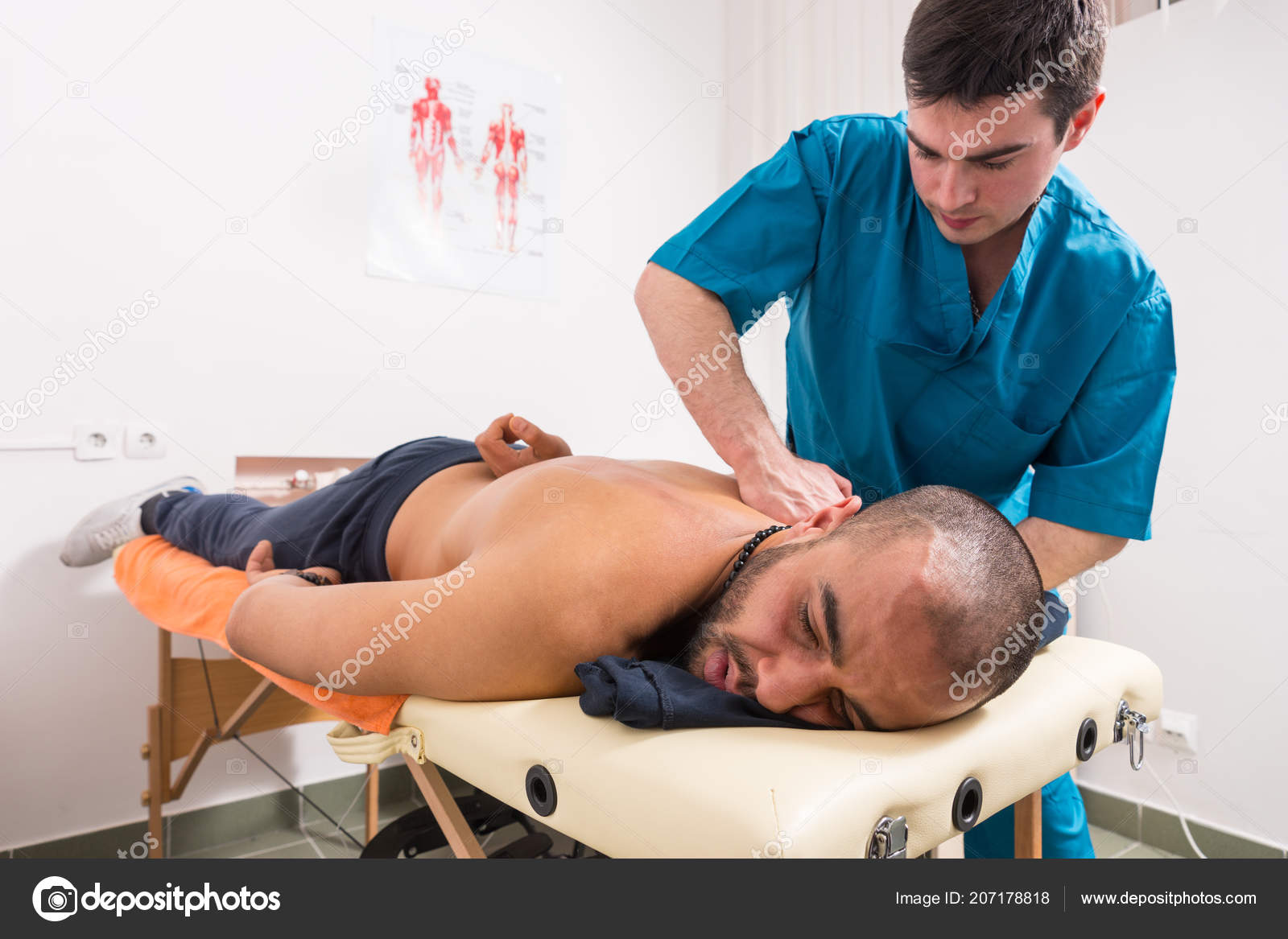Male Massager Therapist Doing Therapeutic Back Massage Ot Client