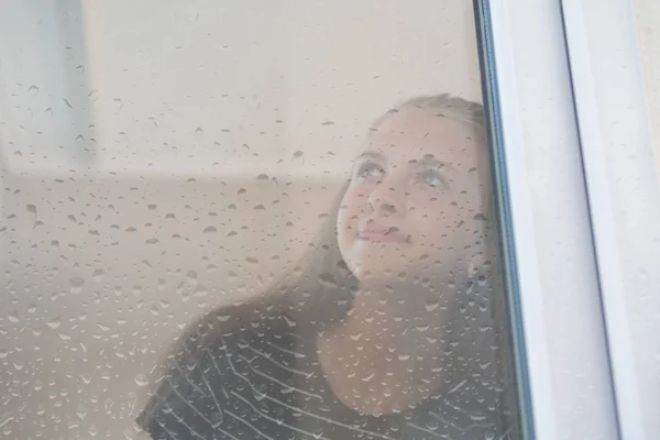 Young Woman Staring Out Wet Window Raindrops Looking Sky Smile — Stock Photo, Image