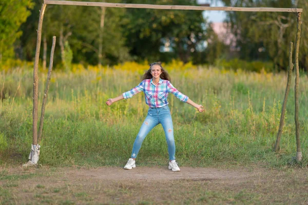 Fun Young Woman Defending Goal Standing Old Rustic Wooden Goalpost — Stock Photo, Image