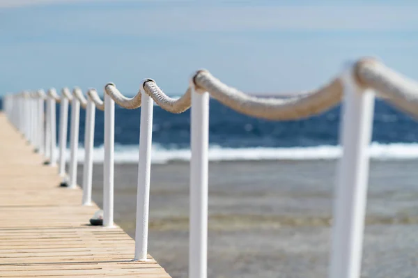 Poles Ropes Lining Wooden Boardwalk Pier Calm Ocean Tropical Beachfront — Stock Photo, Image