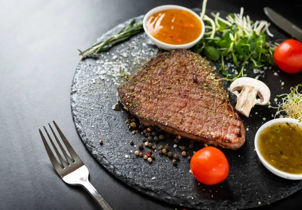 Serving of tender lean grilled beef steak — Stock Photo, Image