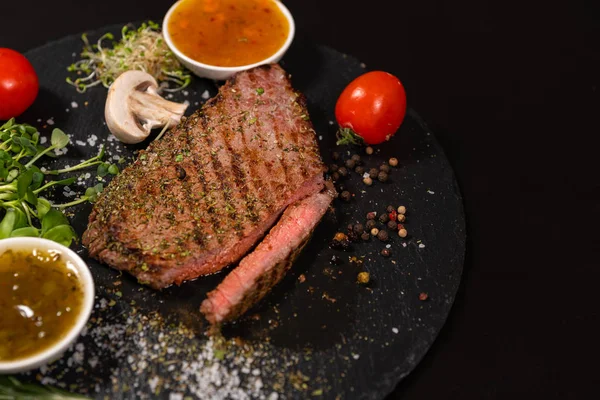 Sliced through medium rare tender grilled steak — Stock Photo, Image