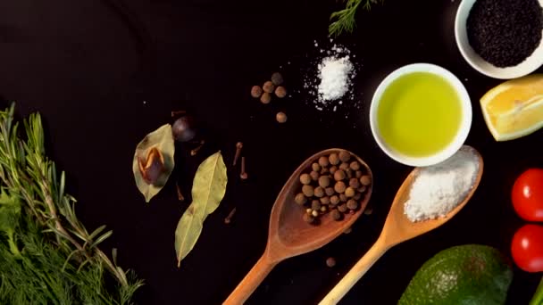 Flat lay of fresh herbs and spices for cooking — Stock Video