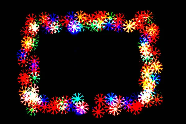 Copos Nieve Colores Forman Frame Bokeh Copos Nieve Aislados Negro — Foto de Stock
