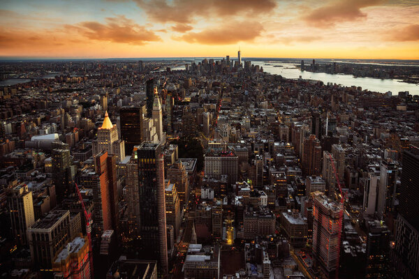 New York city skyline with urban skyscrapers at sunset, NYC USA