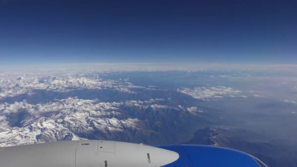 Commercial Aircraft Passenger Window View Airplane Engine Alps Mountains Covered — Stock Video