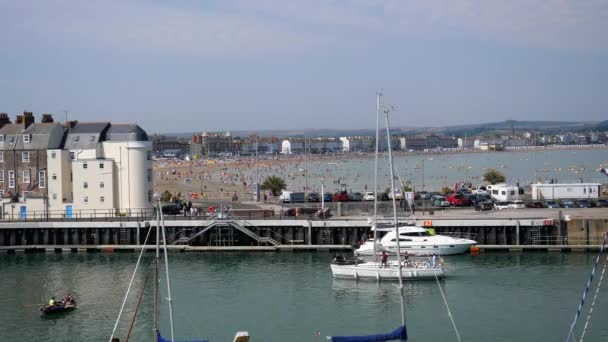 Boats Passing Weymouth City Harbour Harbor People Beach Swimming Background — Stock Video