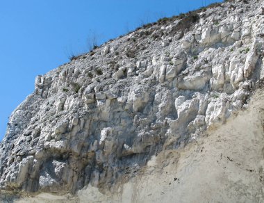 Closeup cliff tebeşir ve çim Makinası