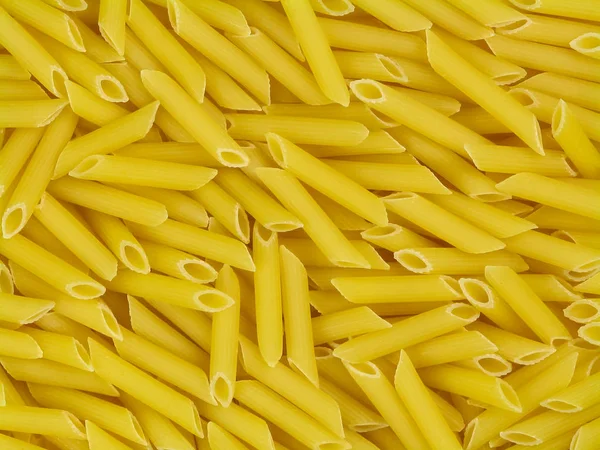 Penne doppia rigatura olasz tészta textúra — Stock Fotó