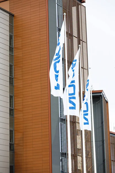 Nokia flags wave in the wind — Stock Photo, Image