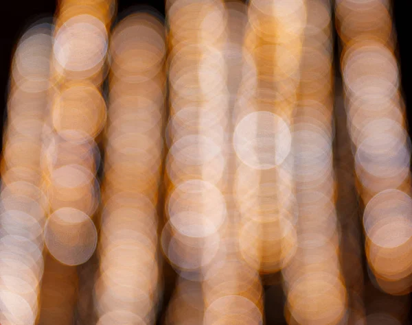 Sfocatura sfondo di colore oro bokeh luce — Foto Stock