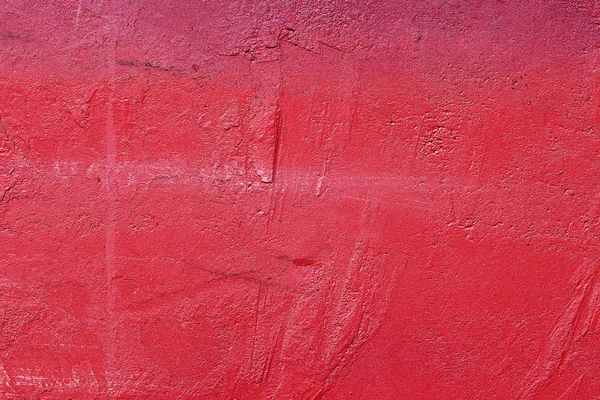 Old style red concrete wall close-up texture background