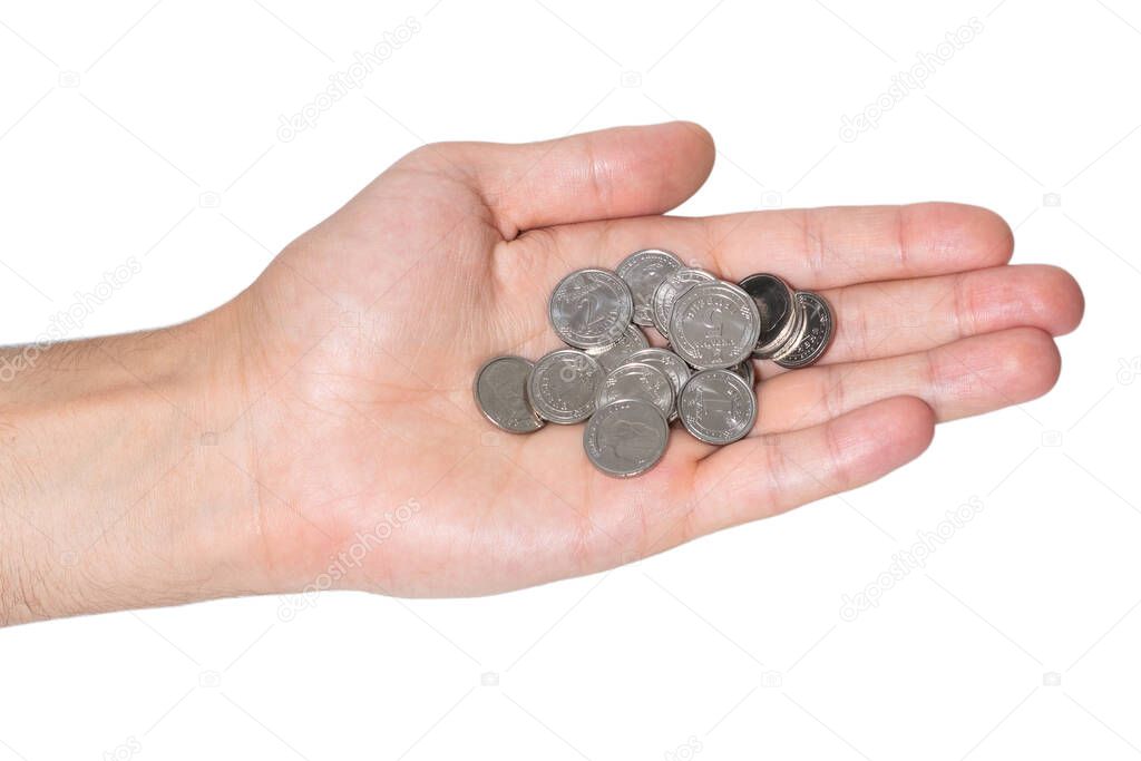 Coins in hands. Hand holding coins. Ukrainian money.
