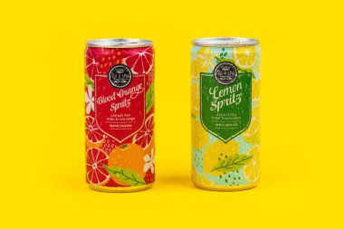 DNIPRO, UKRAINE - 04 aug 2025: Allini Spritz fruits drink in a tin can on yellow.