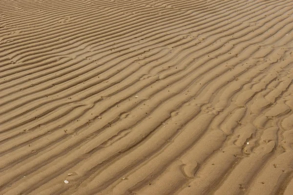 Beautiful pattern is a wave pattern of sand that is formed by sea water.