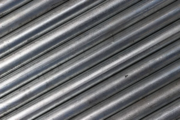 Galvanized steel pipe are put together in a diagonal position.