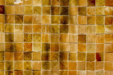 Küçük taşlarla eski duvar.