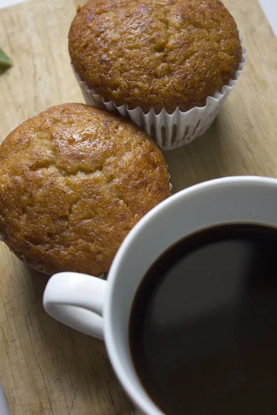 stock image Black coffee in white glass and Banana Cake Put on a Wood