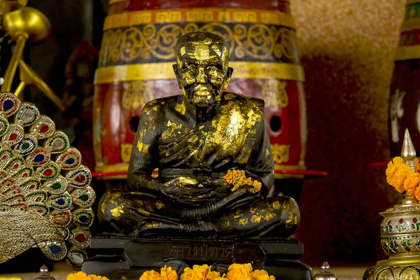 Statue of a monk meditating