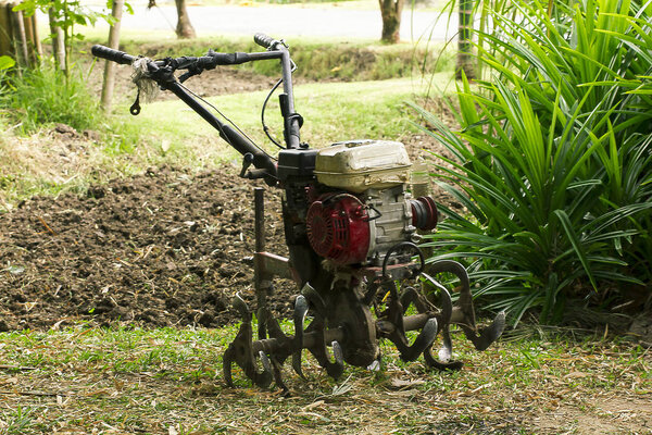 Rotary tiller helps to prepare the soil for modern farmers.