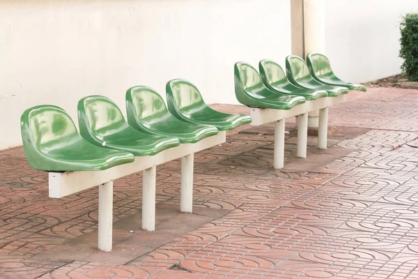Green Plastic Chair Bus Stop Passengers Waiting — Stock Photo, Image