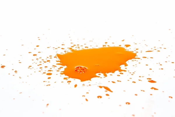 Oranje Waterdruppels Spatten Een Witte Achtergrond — Stockfoto