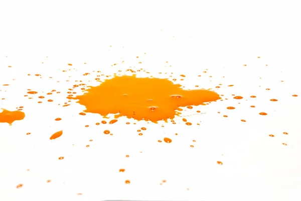 Oranje Waterdruppels Spatten Een Witte Achtergrond — Stockfoto