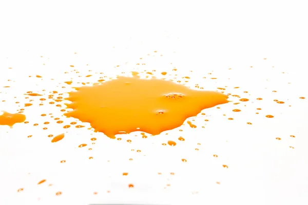 Oranje Waterdruppels Spatten Een Witte Achtergrond — Stockfoto