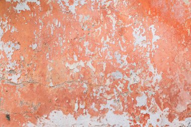 Soluk kırmızı boya arka plan doku Pütürlü yüzeyi ve çizikler ile yıpranmış