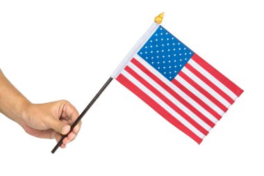 Amerika Birleşik Devletleri izole kırpma yolu ile beyaz arka plan üzerinde bayrak tutan el yakın çekim