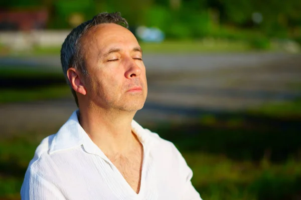 Meditation by the river. Early morning. Sunrise with some mist on the lake in Canada.