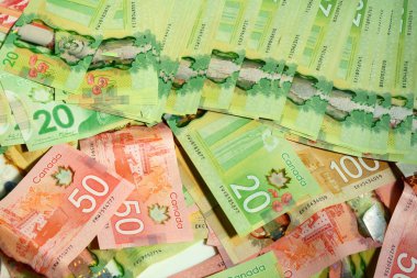 Montreal, Quebec, Kanada / Aralık, 16 2018: Kanada Doları faturaları yaymak ve çerçevenin dolgu.                               