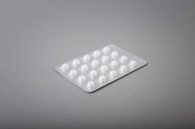 Gri arka plandaki hapların kapatılması