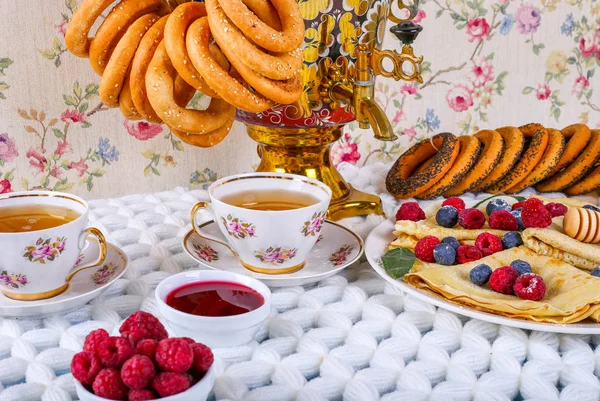 tea drinking with a samovar. Maslenitsa. russian pancake week.