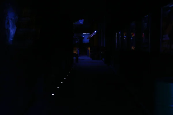 the restaurant is dark. Long dark corridor to the restaurant